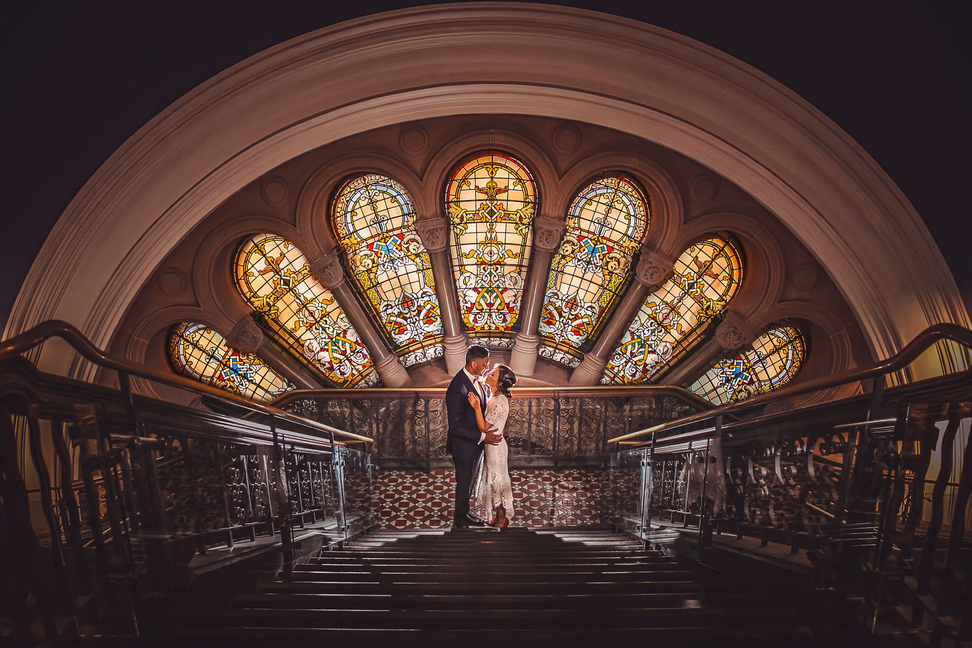 Bride on the staircase beneath the QVB dome, Sydney — Ellanora and Ashneel, photographed by Azayda