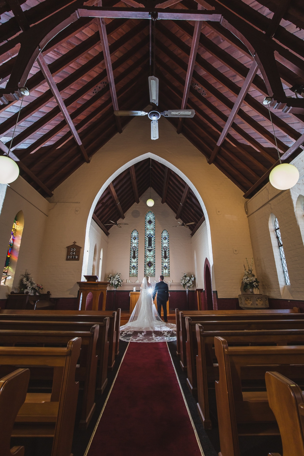 Sydney wedding photographer Bass capturing an intimate embrace on a wedding day
