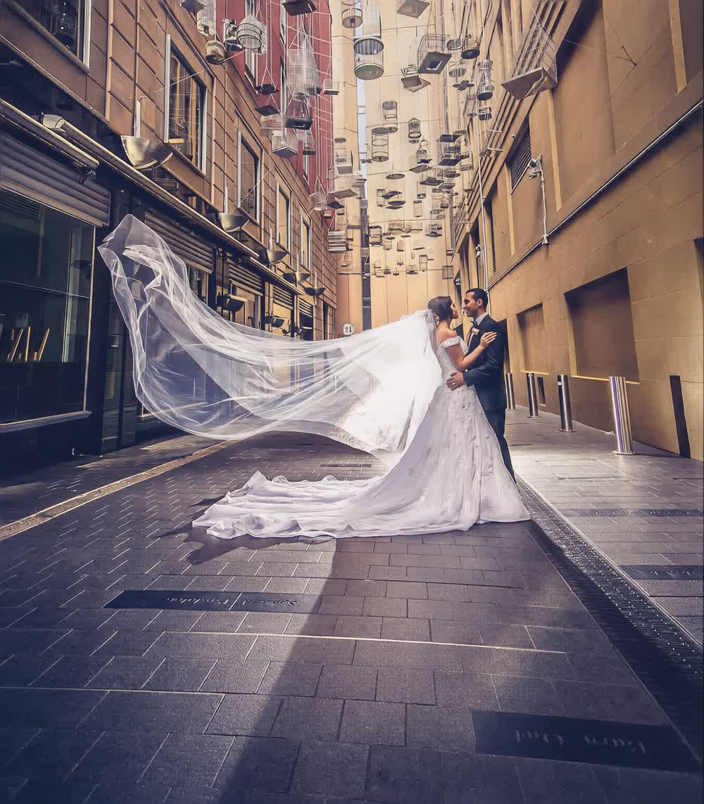 A bride's veil falling into a full train at Angel Place, Sydney — Fady and Yostina, photographed by Azayda